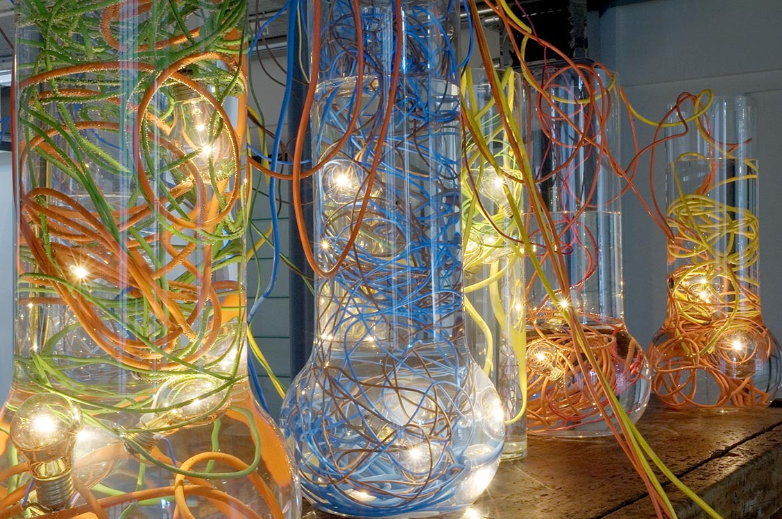 Flood, a light made of lightbulbs and cables in water by Michael Cross and Julie Mathias