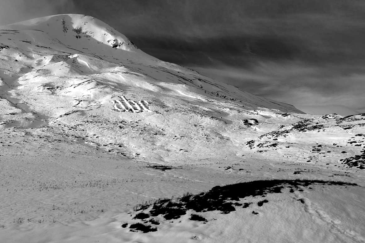 Melt by Michael Cross, the letters abc made of snow piled up on a hillside in Scotland